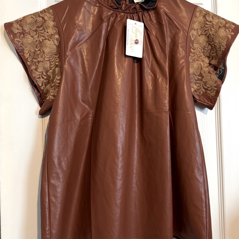 NWT Women’s top. Size small